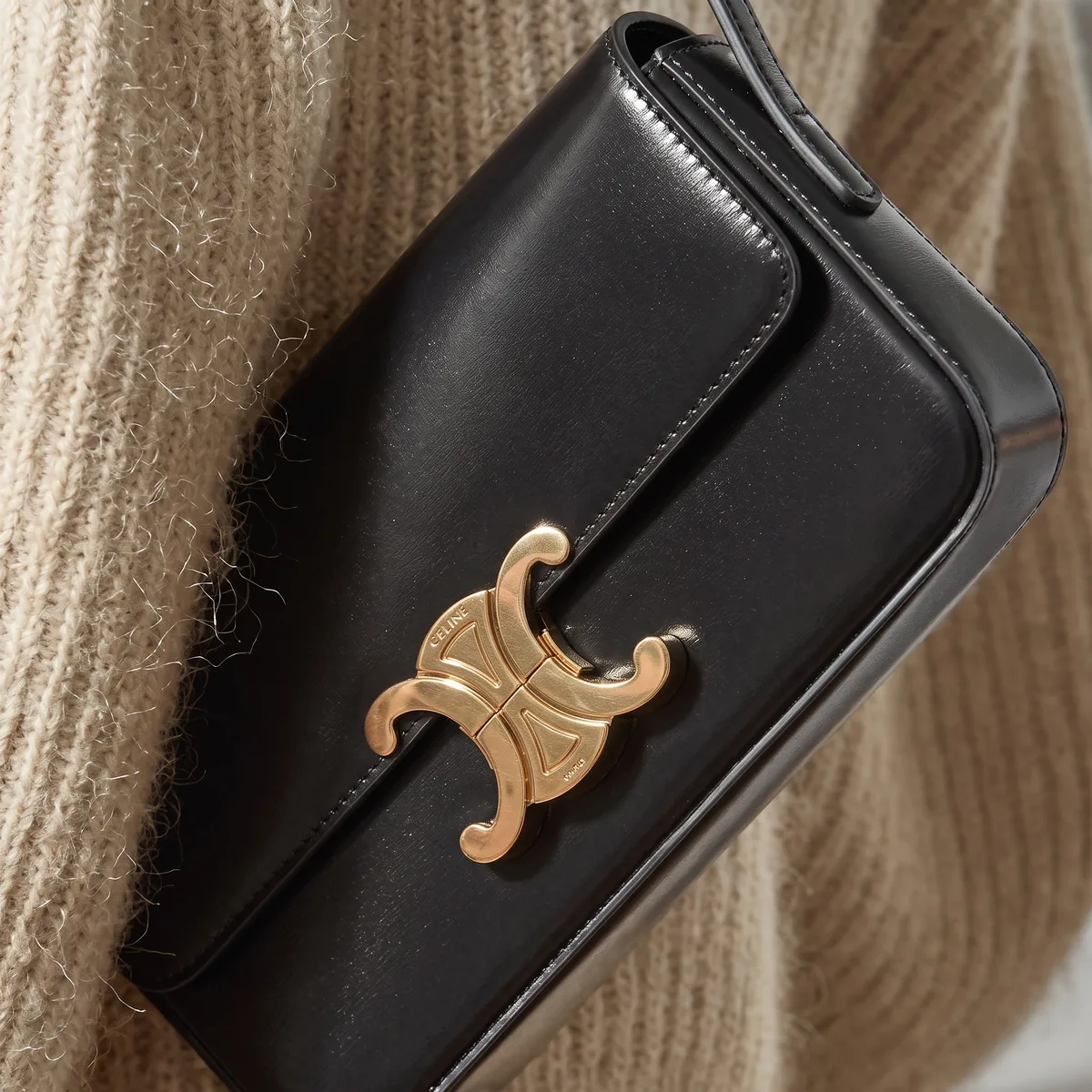 Black leather clutch found with visual search