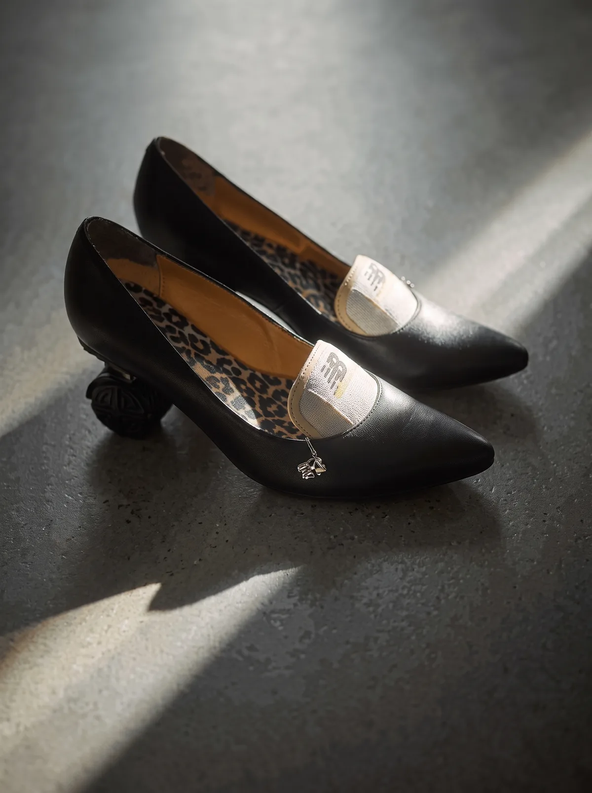 Black heels with silver toe